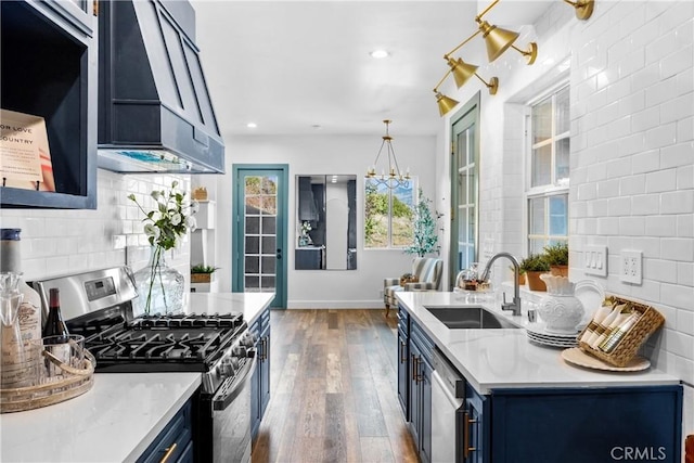 791 Cypress Rd, Cedar Glen, CA 92321 - kitchen featuring appliances with stainless steel finishes, blue cabinets, dark wood-style floors, tasteful backsplash, and recessed lighting