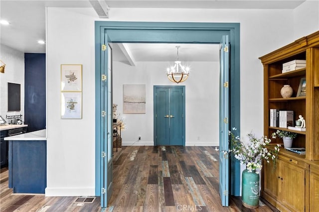 791 Cypress Rd, Lake Arrowhead, CA 92321 - foyer with dark wood-style floors, a chandelier, and baseboards