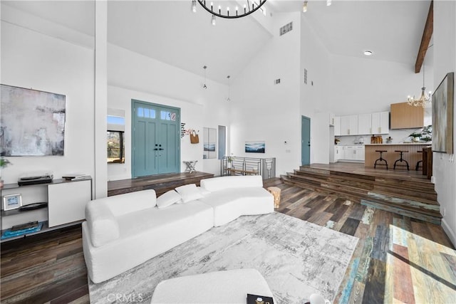 791 Cypress Rd, Lake Arrowhead, CA 92321 - living area with a chandelier, dark wood finished floors, and high vaulted ceiling