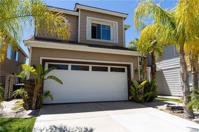 view of front of home featuring a garage and driveway