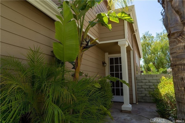 view of property exterior featuring fence