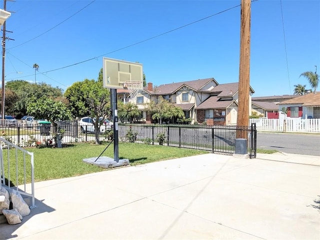 view of sport court featuring a residential view