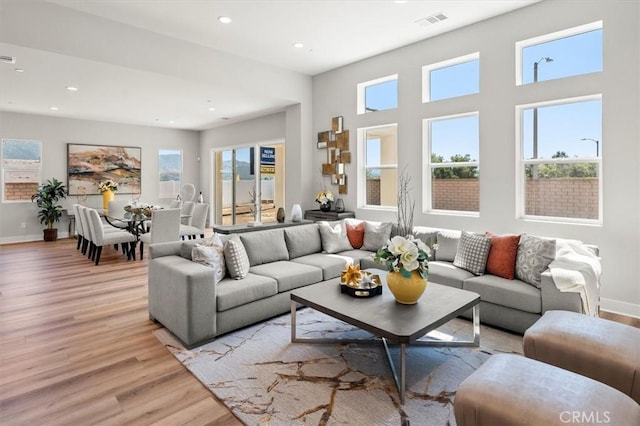 6533 Canyon Oaks Dr, Simi Valley, CA 93063 - living room featuring light wood-style flooring, recessed lighting, and baseboards