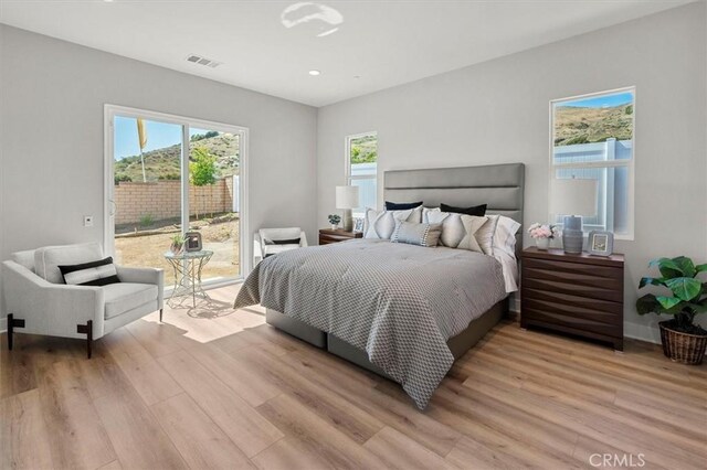 6533 Canyon Oaks Dr, Simi Valley, CA 93063 - bedroom featuring access to outside, light wood-style floors, and recessed lighting