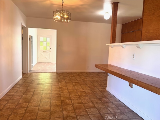 15602 Pitts Ave, Paramount, CA 90723 - empty room featuring baseboards, a chandelier, and a heating unit