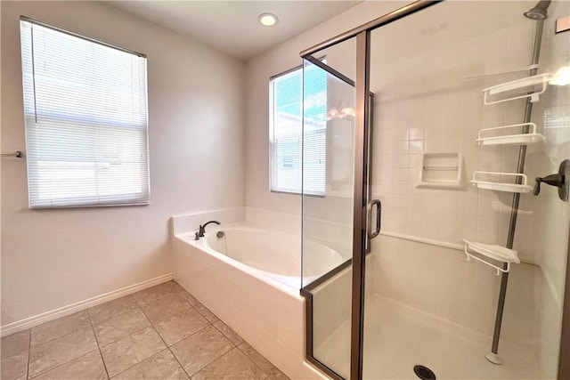 2873 S Via Belamaria, Ontario, CA 91762 - full bathroom featuring a bath, a shower stall, baseboards, and tile patterned floors