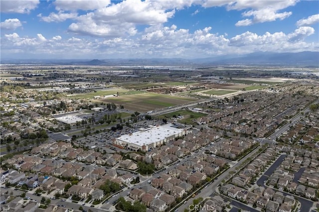2873 S Via Belamaria, Ontario, CA 91762 - aerial view of property and surrounding area featuring mountains and nearby suburban area