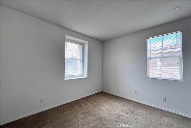 2873 S Via Belamaria, Ontario, CA 91762 - carpeted empty room with baseboards