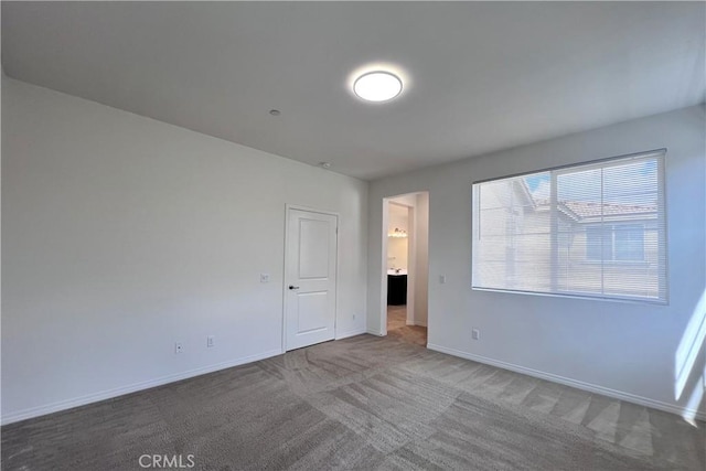 2873 S Via Belamaria, Ontario, CA 91762 - unfurnished bedroom with baseboards and carpet floors