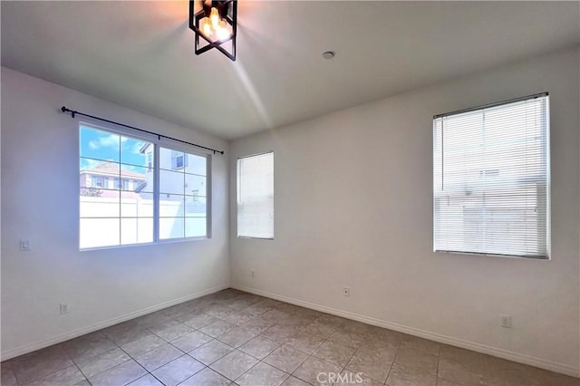 2873 S Via Belamaria, Ontario, CA 91762 - unfurnished room featuring baseboards and light tile patterned floors