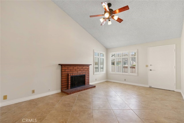 20081 Winfield Ct Unit 2, Yorba Linda, CA 92886 - unfurnished living room with a textured ceiling, a ceiling fan, light tile patterned flooring, a fireplace, and high vaulted ceiling