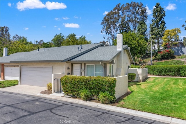 20081 Winfield Ct Unit 2, Yorba Linda, CA 92886 - view of front of home with a chimney, an attached garage, driveway, stucco siding, and roof with shingles