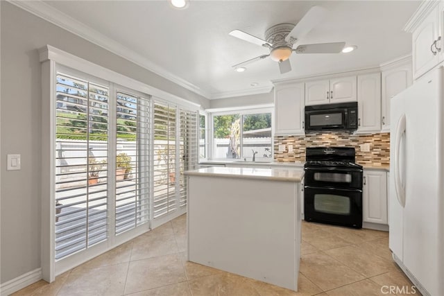 20081 Winfield Ct Unit 2, Yorba Linda, CA 92886 - kitchen with black appliances, light countertops, white cabinets, decorative backsplash, and ornamental molding