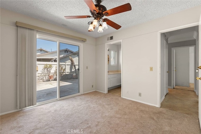20081 Winfield Ct Unit 2, Yorba Linda, CA 92886 - unfurnished bedroom with access to exterior, light colored carpet, a textured ceiling, baseboards, and ceiling fan