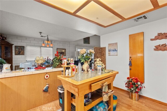 32923 Tindall Ave, Acton, CA 93510 - kitchen with light wood-style floors and tile countertops