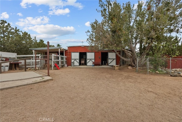 32923 Tindall Ave, Acton, CA 93510 - rear view of property featuring an outbuilding and an exterior structure
