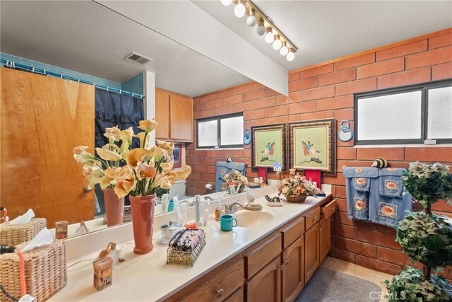 32923 Tindall Ave, Acton, CA 93510 - full bath featuring vanity, a textured ceiling, and curtained shower