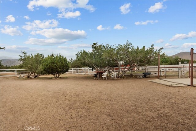 32923 Tindall Ave, Acton, CA 93510 - view of home's community with a mountain view and fence