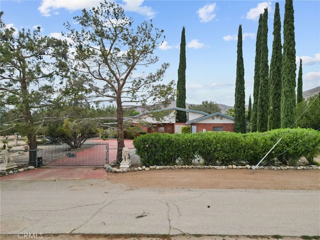 32923 Tindall Ave, Acton, CA 93510 - view of home's exterior with a gate