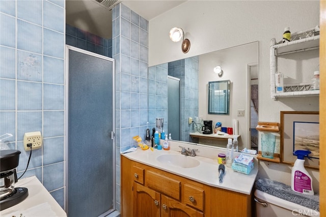 32923 Tindall Ave, Acton, CA 93510 - bathroom with a stall shower, vanity, and tile walls