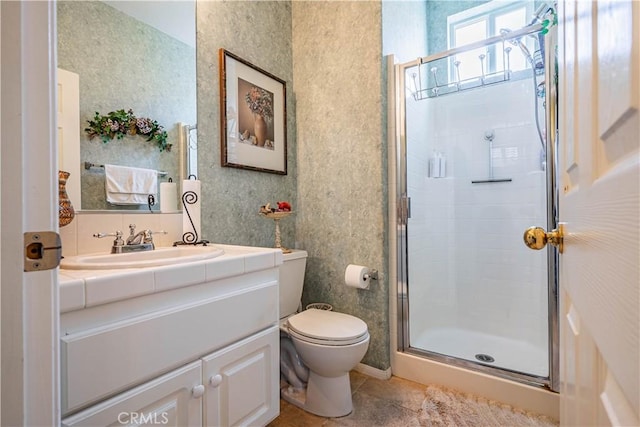 15108 Lighthouse Ln, Lake Elsinore, CA 92530 - bathroom featuring a shower stall, toilet, vanity, and tile patterned flooring