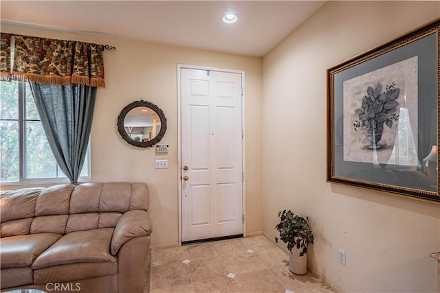 15108 Lighthouse Ln, Lake Elsinore, CA 92530 - entryway with light tile patterned flooring, recessed lighting, and baseboards