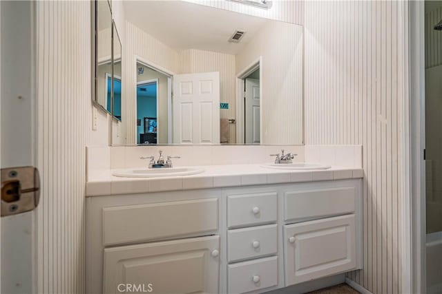 15108 Lighthouse Ln, Lake Elsinore, CA 92530 - full bath with wallpapered walls and double vanity