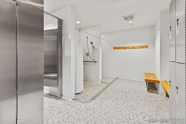 bathroom featuring recessed lighting