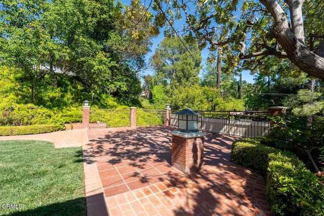 view of patio with view of scattered trees