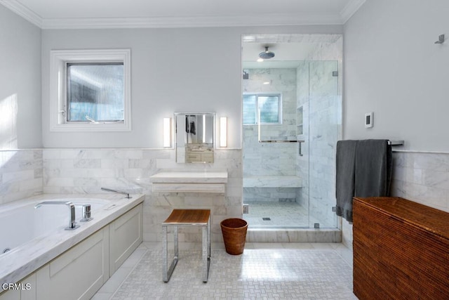 full bath with tile walls, a shower stall, tile patterned flooring, a bath, and ornamental molding