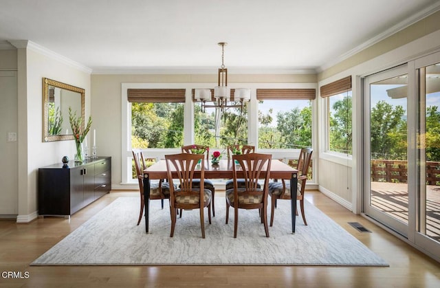 5109 Redwillow Ln, La Canada Flintridge, CA 91011 - dining space with plenty of natural light, a chandelier, crown molding, and wood finished floors