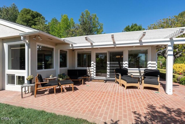 5109 Redwillow Ln, La Canada Flintridge, CA 91011 - rear view of property with a pergola, a patio area, an outdoor living space, and stucco siding