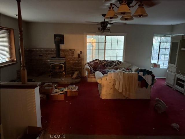 17861 Fresno St, Hesperia, CA 92345 - bedroom with a wood stove and a ceiling fan