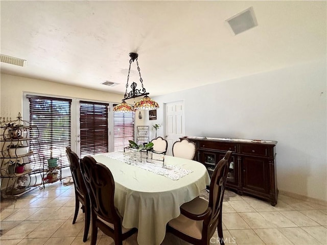 7442 Camarilla Ave, Yucca Valley, CA 92284 - dining area with light tile patterned floors