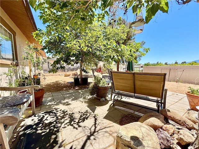 7442 Camarilla Ave, Yucca Valley, CA 92284 - view of patio / terrace with fence
