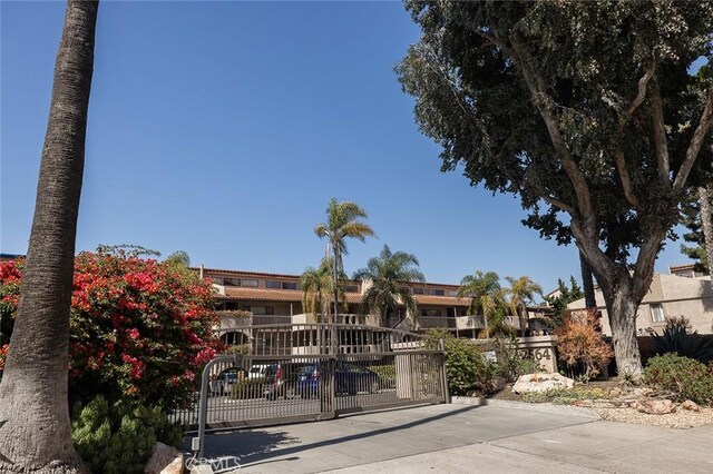 view of building exterior featuring fence