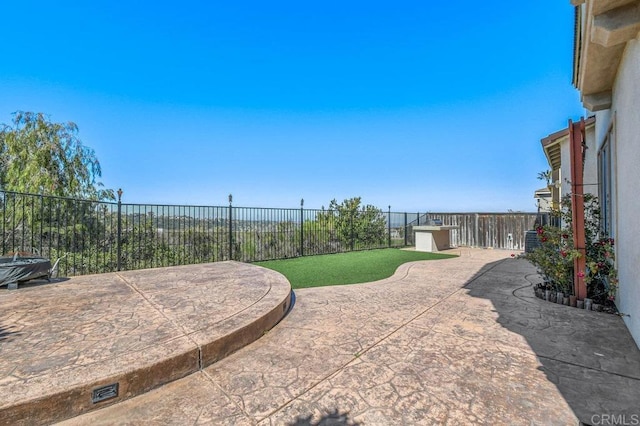 view of patio with a fenced backyard