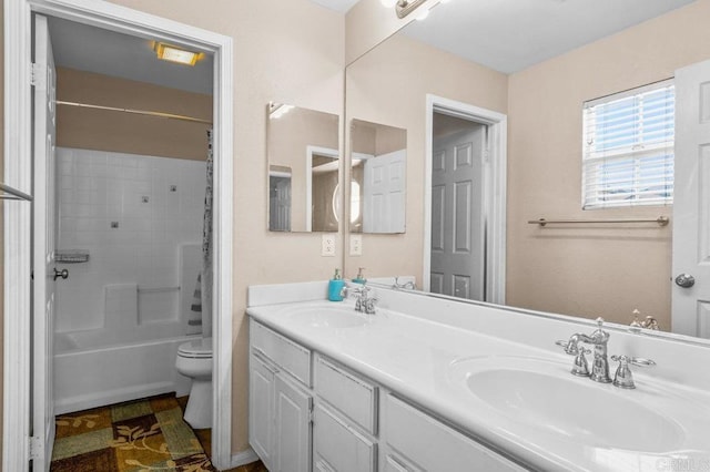 bathroom with toilet, double vanity, and shower / bathtub combination