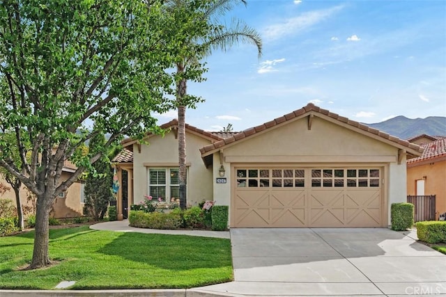 24247 Songsparrow Ln, Corona, CA 92883 - view of front of home with stucco siding, a garage, concrete driveway, a front yard, and a tiled roof