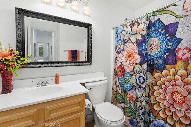 24247 Songsparrow Ln, Corona, CA 92883 - bathroom featuring toilet, vanity, and curtained shower