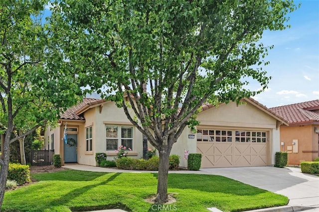 24247 Songsparrow Ln, Corona, CA 92883 - view of front facade with a tiled roof, stucco siding, an attached garage, and driveway