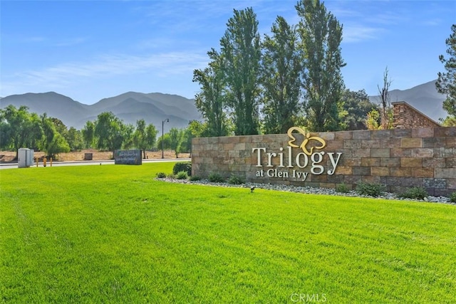 24247 Songsparrow Ln, Corona, CA 92883 - community / neighborhood sign with a mountain view and a lawn