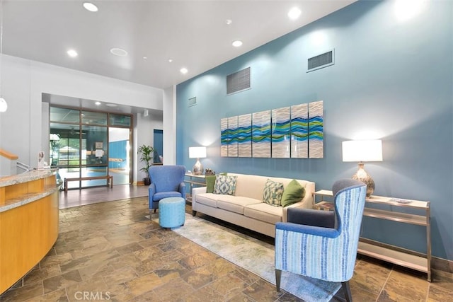 24247 Songsparrow Ln, Corona, CA 92883 - living area with stone tile flooring and recessed lighting