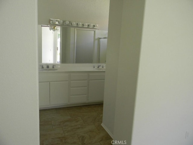 613 Big Spring Dr, Banning, CA 92220 - hall featuring a sink