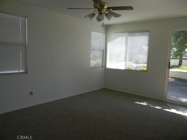 613 Big Spring Dr, Banning, CA 92220 - carpeted empty room featuring a ceiling fan and baseboards
