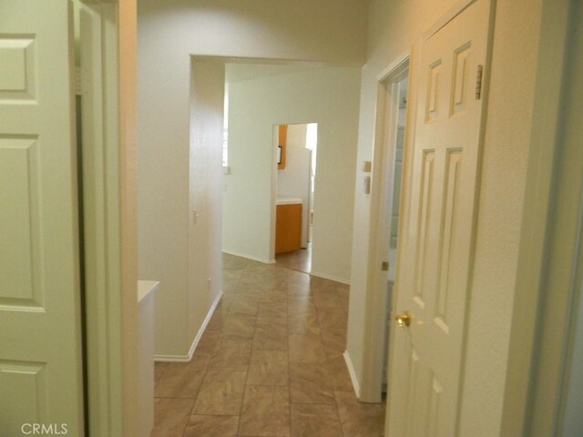 613 Big Spring Dr, Banning, CA 92220 - hallway featuring baseboards