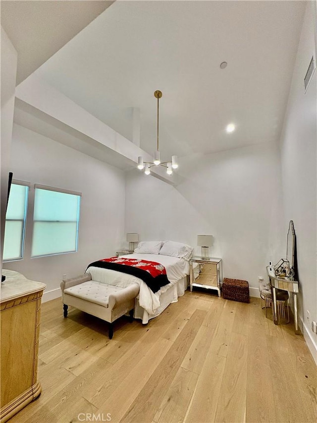 2621 Gates Ave Unit B, Redondo Beach, CA 90278 - bedroom featuring light wood-type flooring and a chandelier