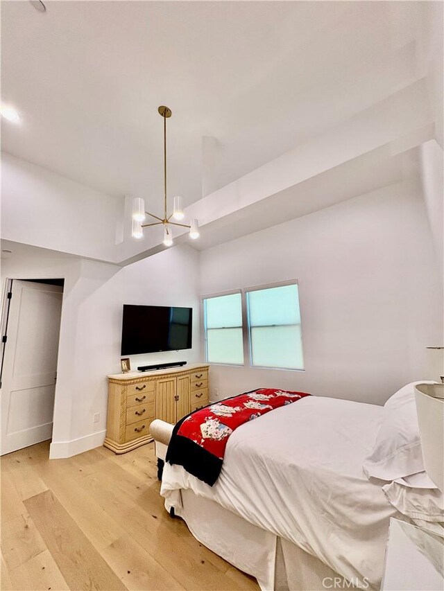 2621 Gates Ave Unit B, Redondo Beach, CA 90278 - bedroom featuring light wood-style floors, a chandelier, and lofted ceiling