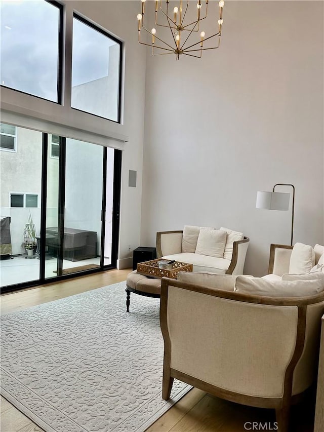2621 Gates Ave Unit B, Redondo Beach, CA 90278 - living area with a chandelier and wood finished floors