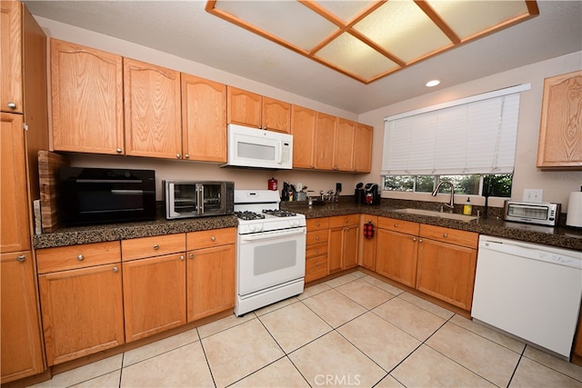 3509 E Berkshire Ct Unit C, Orange, CA 92869 - kitchen featuring white appliances, a sink, light tile patterned flooring, recessed lighting, and dark countertops